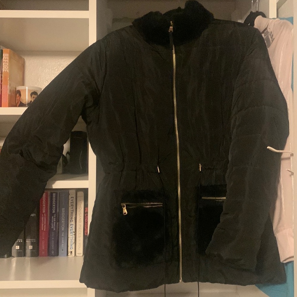 Worn very few times for a trip but grew out of it still in perfect condition
